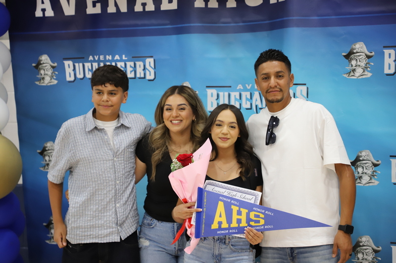 ahs honor roll recipient with family