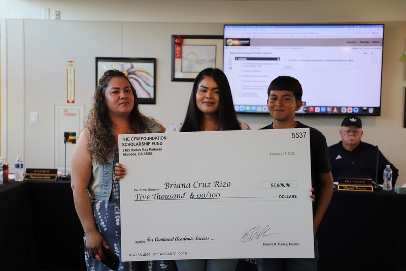 AHS student scholarship recipient with family