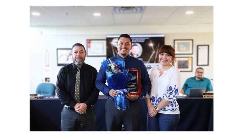 RSUSD Employee of the year recipient with superintendent and board president