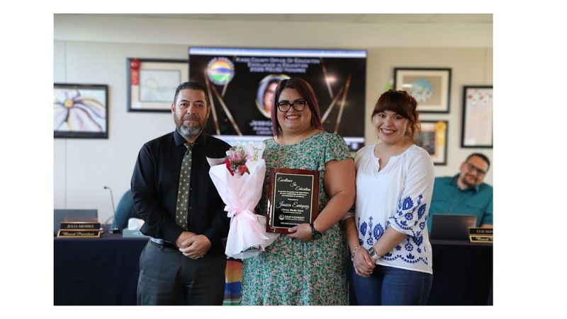 RSUSD Employee of the year recipient with superintendent and board president