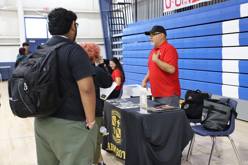 AHS Career Expo students and table leaders in the gym