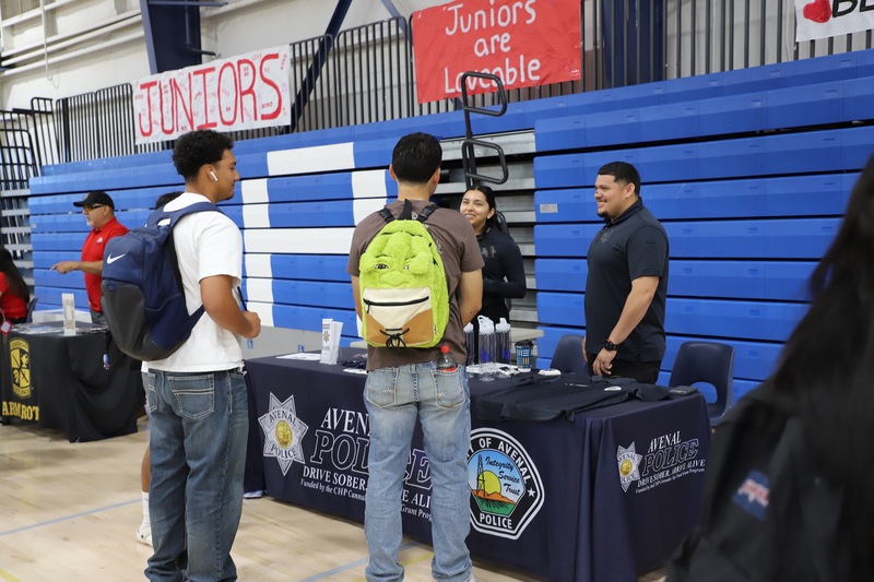 AHS Career Expo students and table leaders in the gym