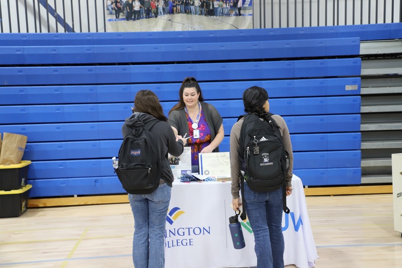 AHS Career Expo students and table leaders in the gym