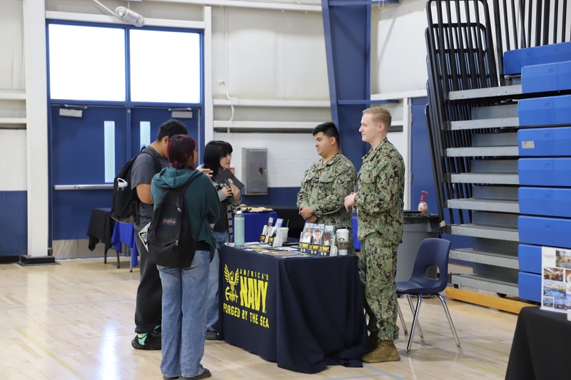 AHS Career Expo students and table leaders in the gym