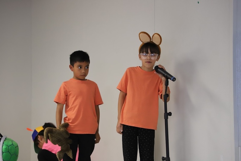 TES students on stage performing Suesstical