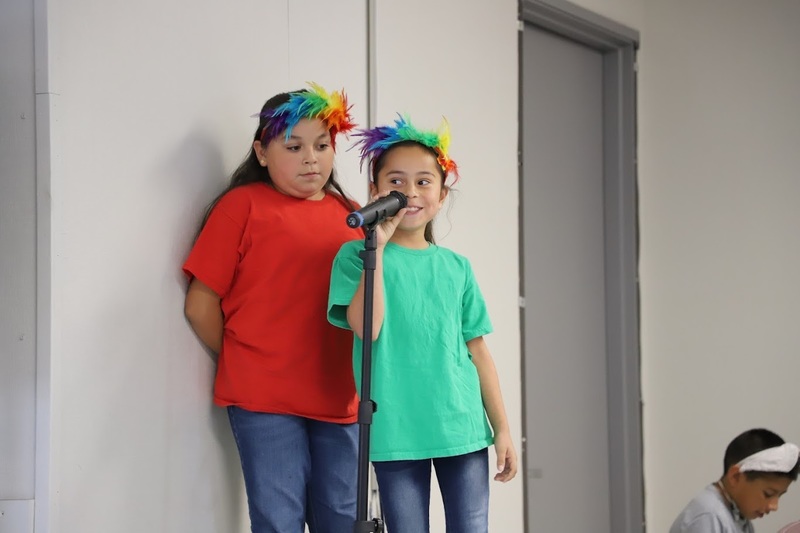 TES students on stage performing Suesstical