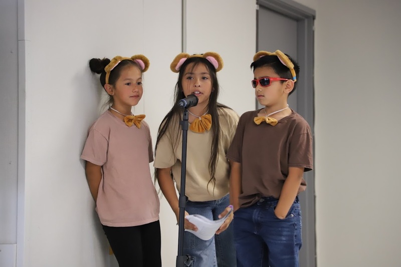 TES students on stage performing Suesstical