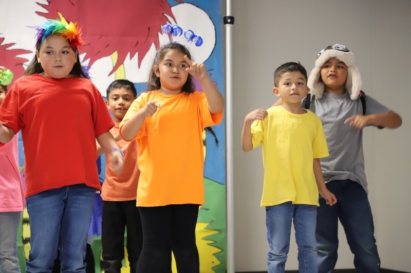 TES students on stage performing Suesstical