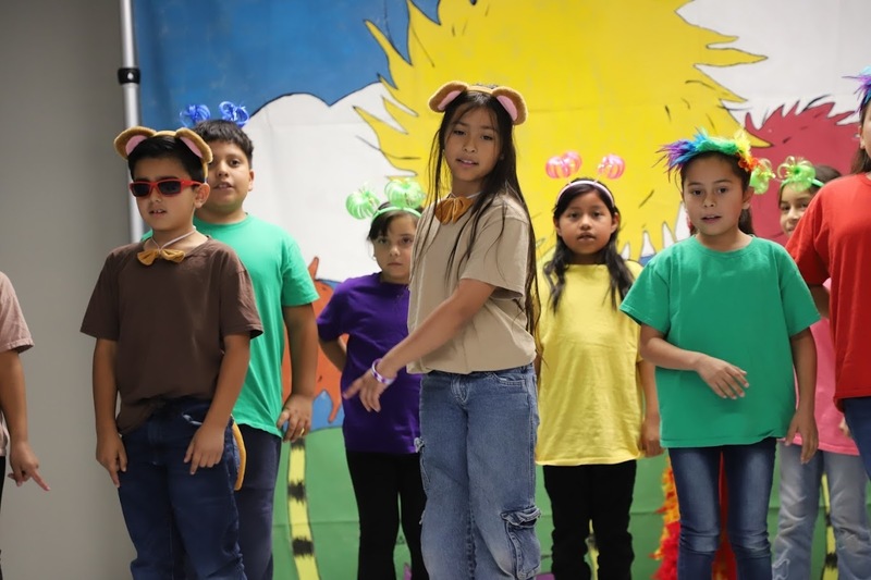 TES students on stage performing Suesstical