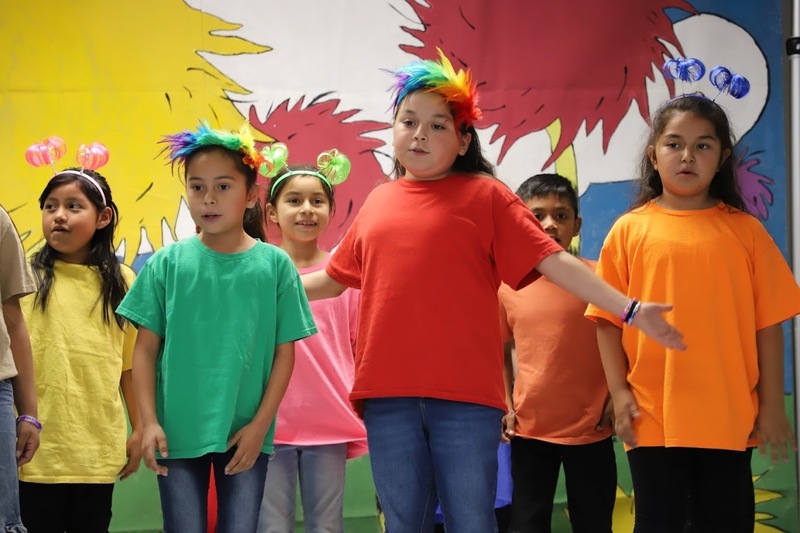 TES students on stage performing Suesstical