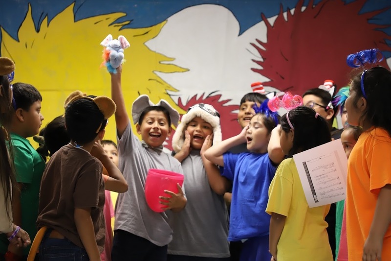 TES students on stage performing Suesstical