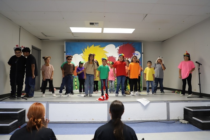 TES students on stage performing Suesstical