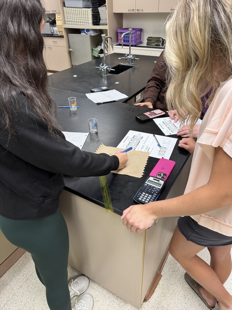 Students measuring a gel cube 