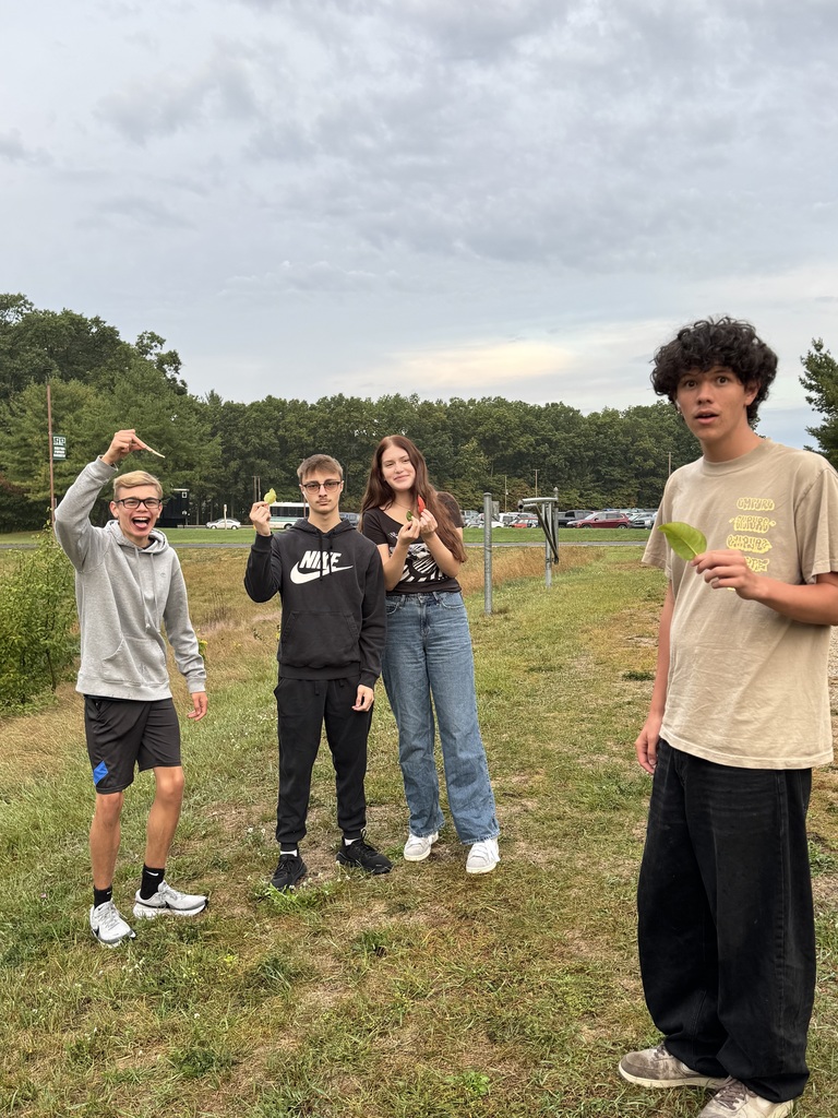 Kids showing off their leaves for study!