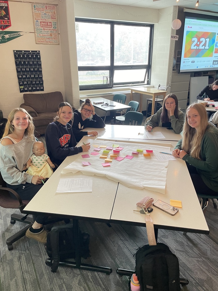 Students discussing the proposed bill. 