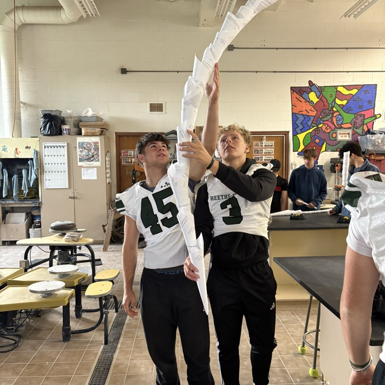 Visual arts students working together to make an installation art project.