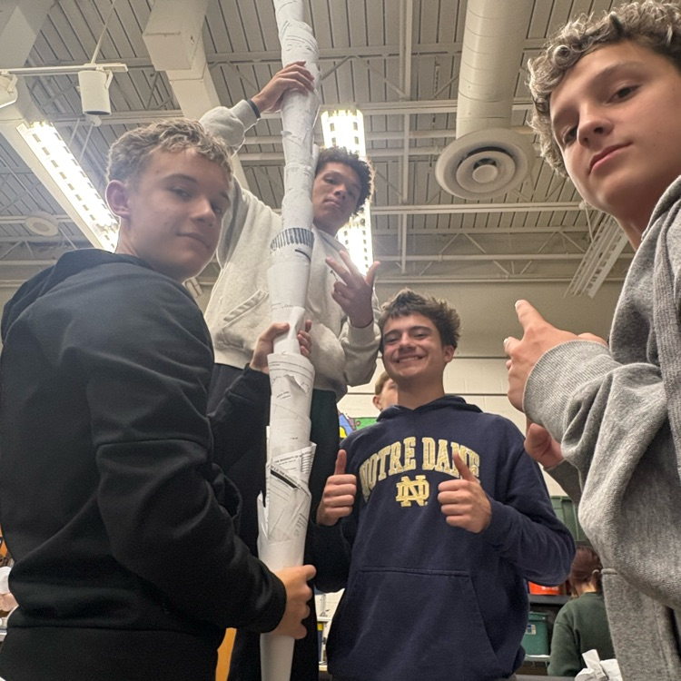 Visual arts students working together to make an installation art project.