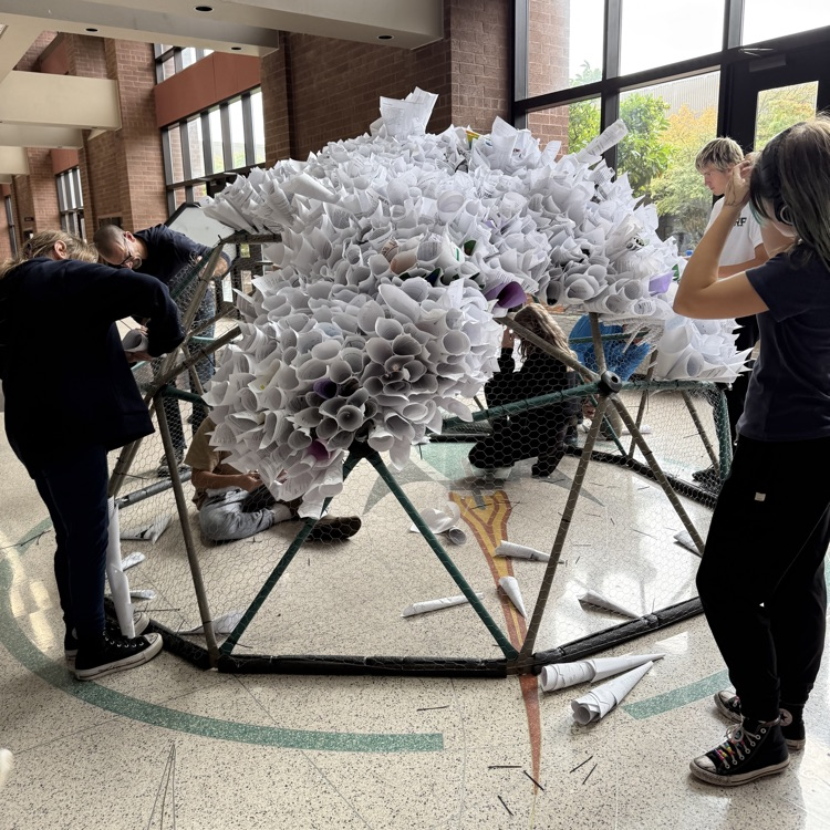 Visual arts students working together to make an installation art project.