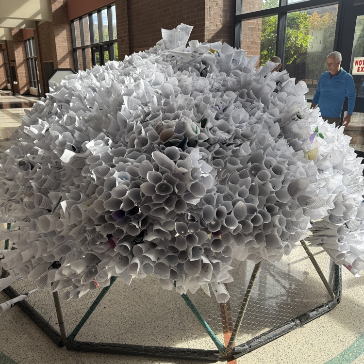 Visual arts students working together to make an installation art project.