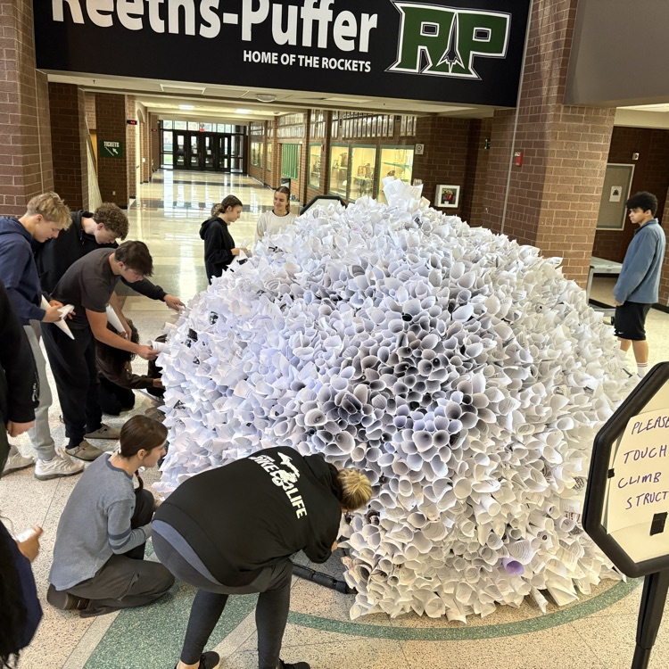 Visual arts students working together to make an installation art project.