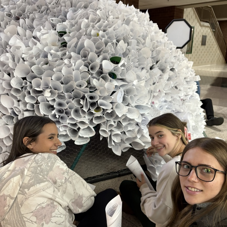 Visual arts students working together to make an installation art project.