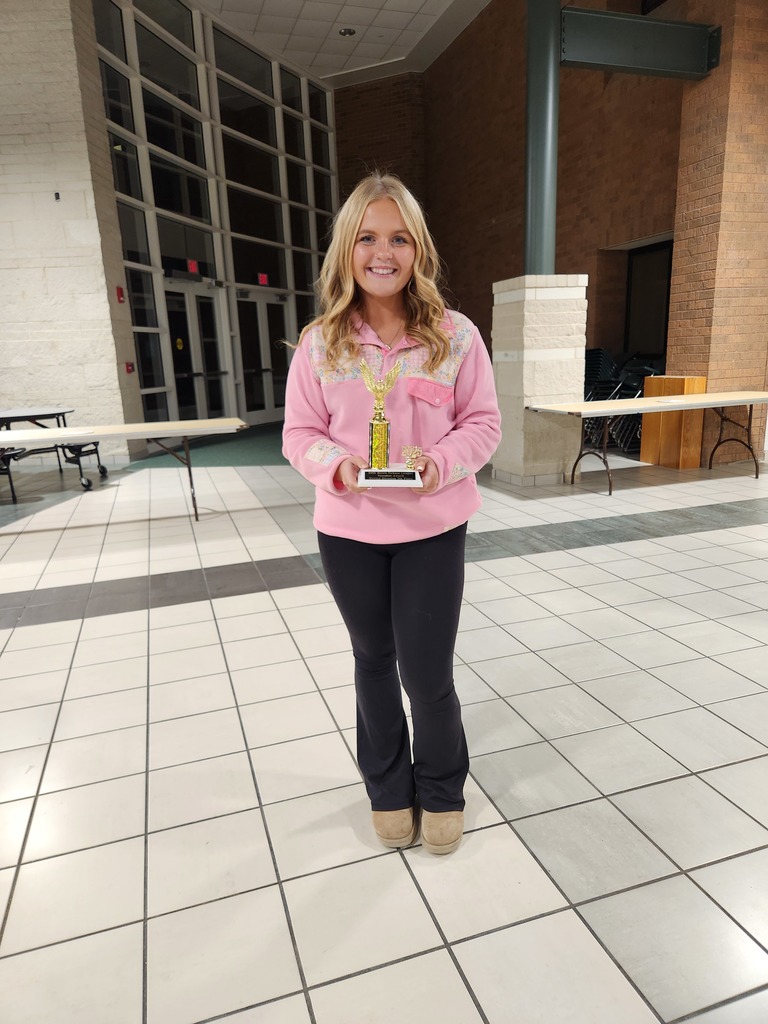 Ava Gibbs with her 7th place trophy.