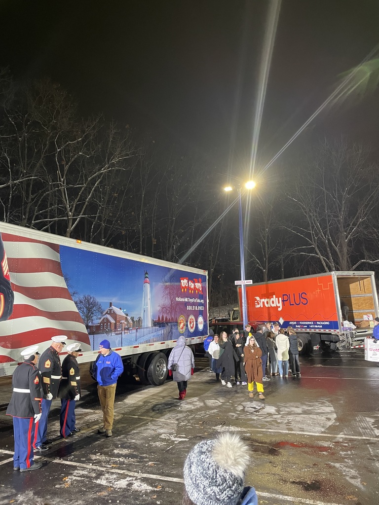 The trucks loading up the toys! 