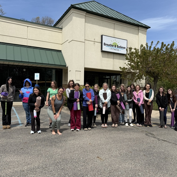 Students in front of Breathe and Believe 