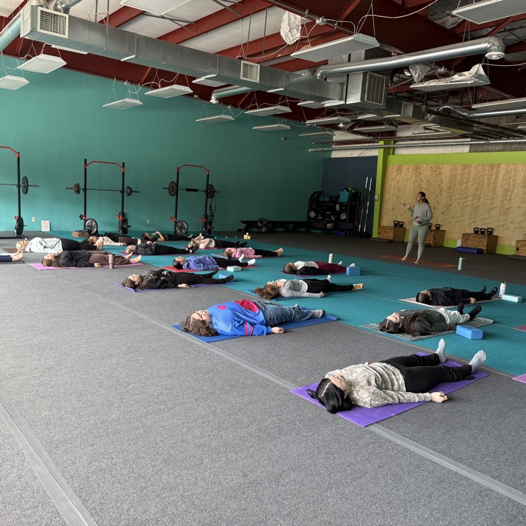 Students doing yoga at Breathe and Believe 
