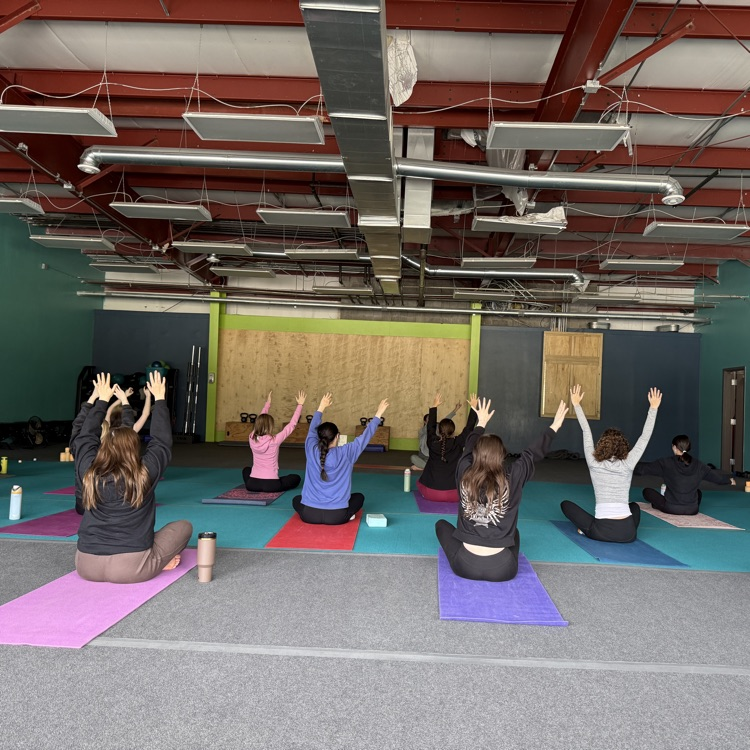 Students doing yoga at Breathe and Believe 