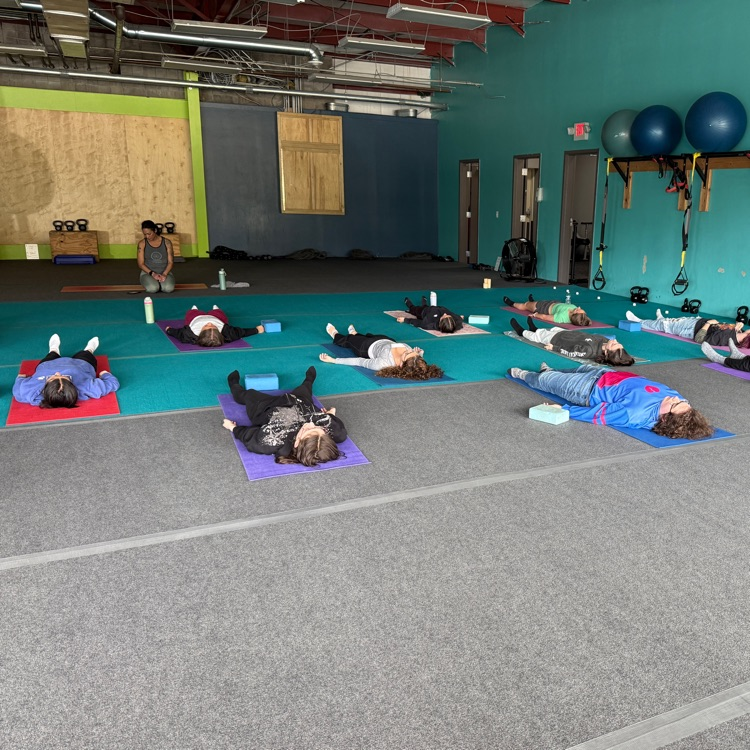 Students doing yoga at Breathe and Believe 
