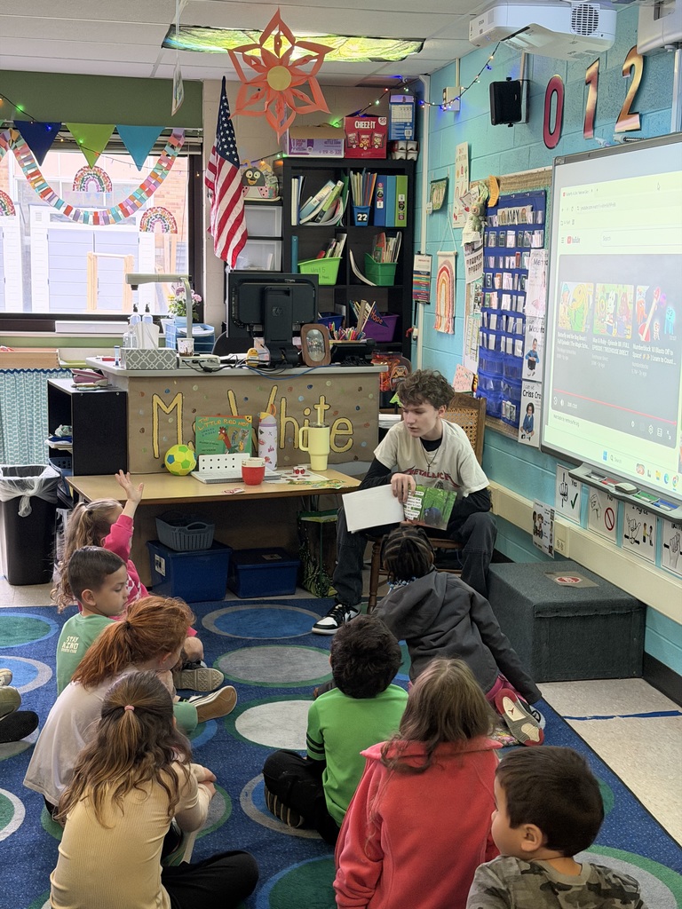 RPHS students reading to RPEL. 