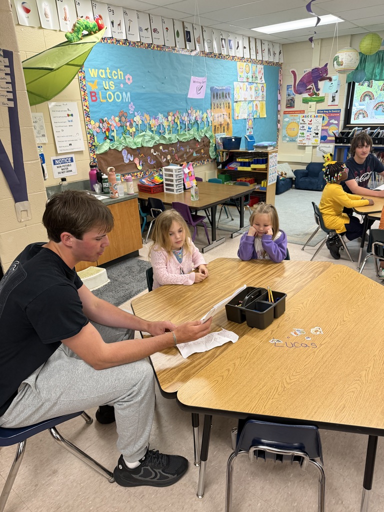RPHS students reading to RPEL. 