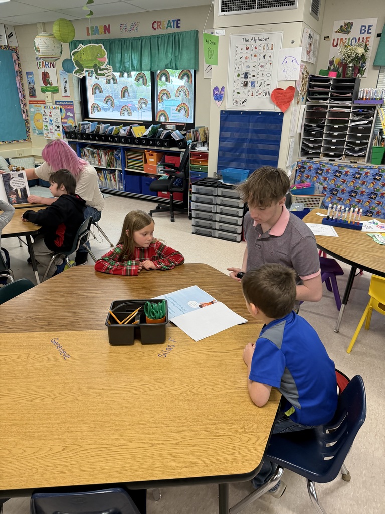 RPHS students reading to RPEL. 