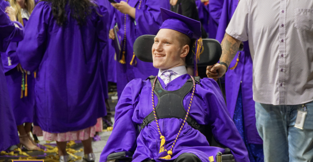 Student in wheelchair graduating high school