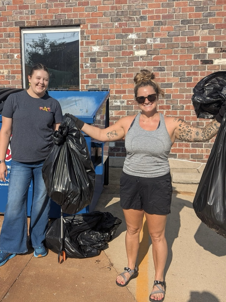 Jen and Maddie with garbage