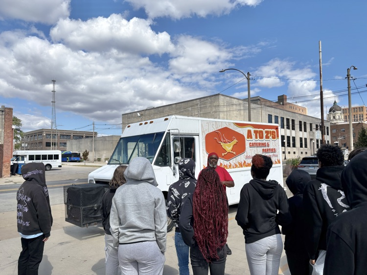 group outside food truck