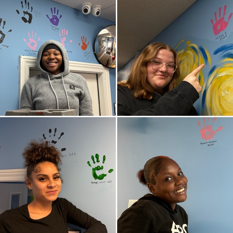 graduates with handprints 1
