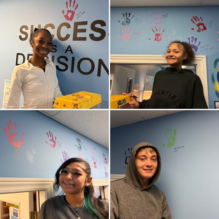 graduates with handprints 2