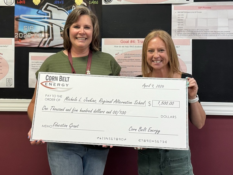 Michele with big check 