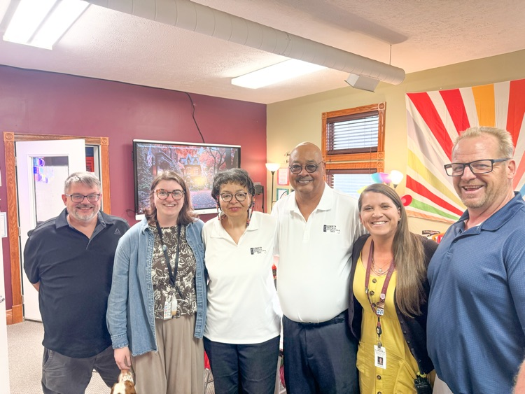 4 RAS staff members standing with Camille and Art Taylor 