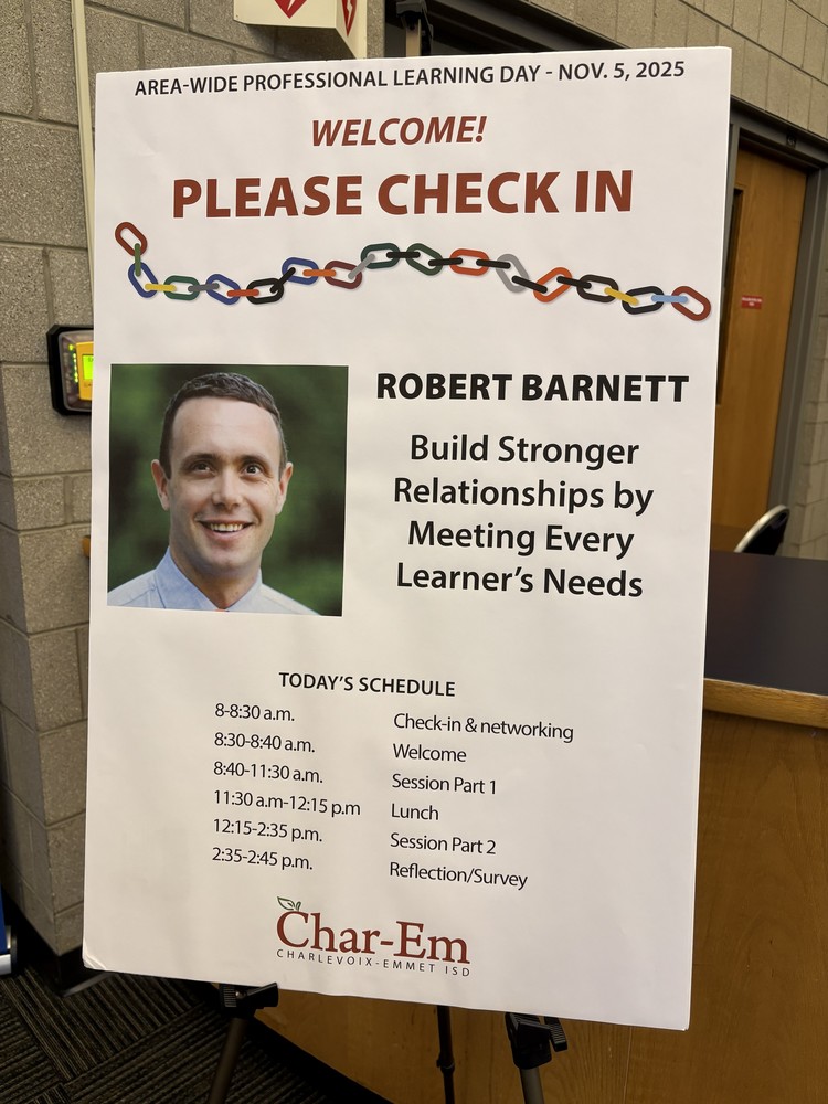 Event welcome sign on an easel that reads “PLEASE CHECK IN” under a colorful linked chain graphic. On the left is a headshot of speaker Robert Barnett. On the right the text reads “ROBERT BARNETT – Build Stronger Relationships by Meeting Every Learner’s Needs. The Char-Em logo is at the bottom.