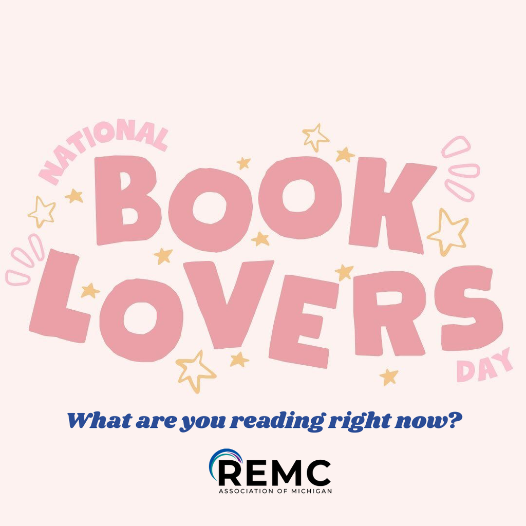 A graphic with a light cream background features the words "National Book Lovers Day" in large, playful pink lettering. Small gold and pink star and doodle accents surround the text. “What are you reading now?” at the bottom with the REMC logo