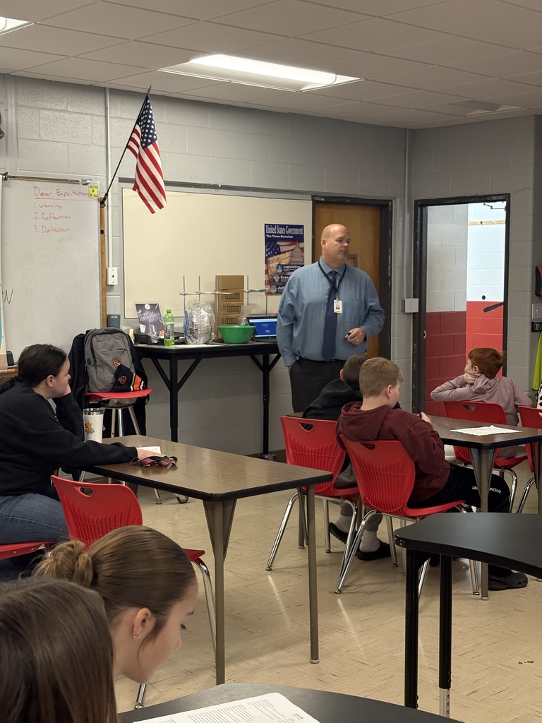 Josh Knuth presenting to students at River Bend