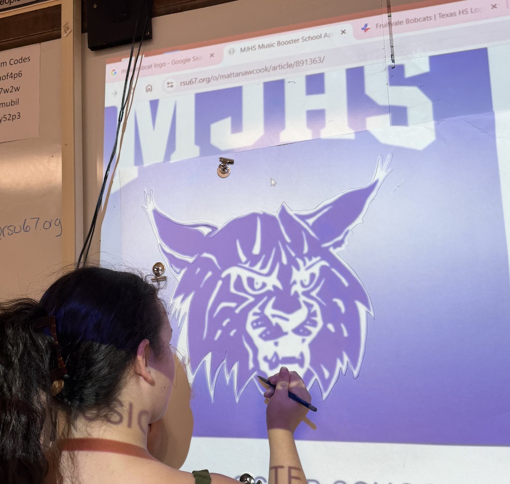 8th Grade Girls creating posters for the soccer team