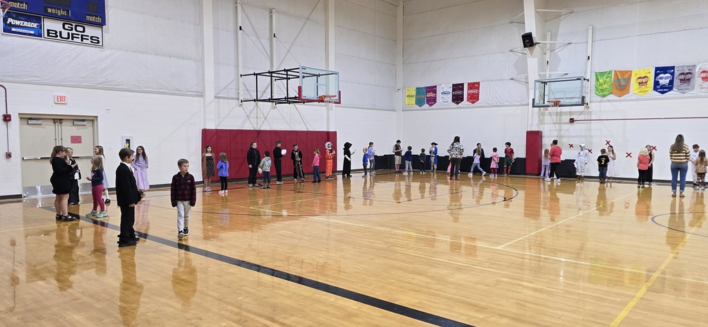 1st grade rotating around the gym