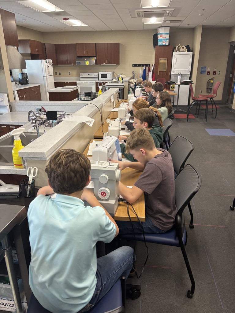 Working hard at the sewing machines.