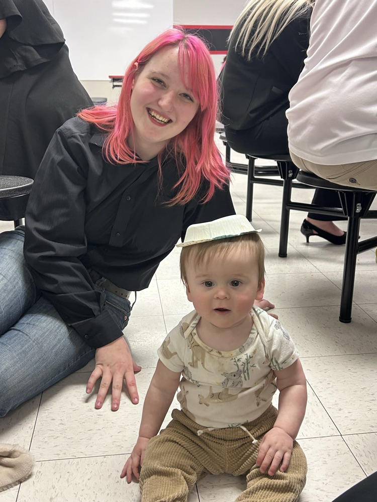 Ren and baby Liam featuring bowl hat