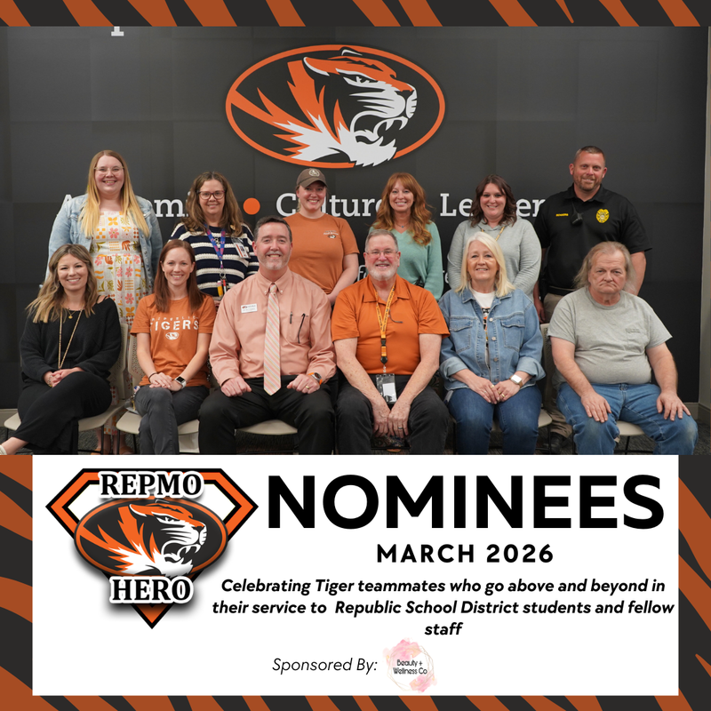 Group photo of twelve RepMo Hero nominees for March 2026. Staff members pose in two rows in front of a Republic Tigers logo. Text below celebrates their service to Republic School District students and staff, sponsored by Beauty + Wellness Co.