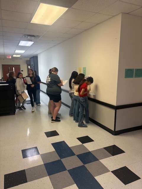 7th grade history students doing a gallery walk